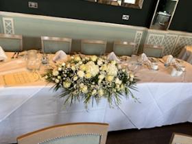 All white top table with hydrangeas 