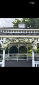 All white garland used as a garland for the Ceremony and then moved to the top table 