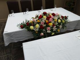 Top Table Arrangement Mixed Roses, Carnations and Orchids 