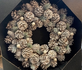 Frosty white pine cone wreath